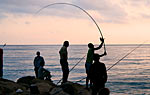 Fishing on the beachin Nice, France